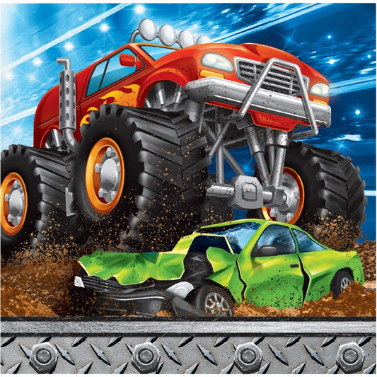 Red monster truck crushing a green car on dirt, with big black tires and bright headlights.