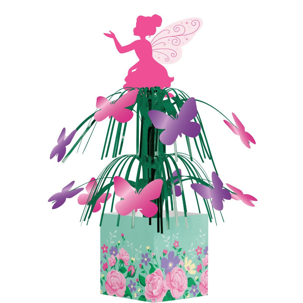 Green floral-themed centerpiece with pink and purple butterfly cutouts and a pink fairy silhouette topper.