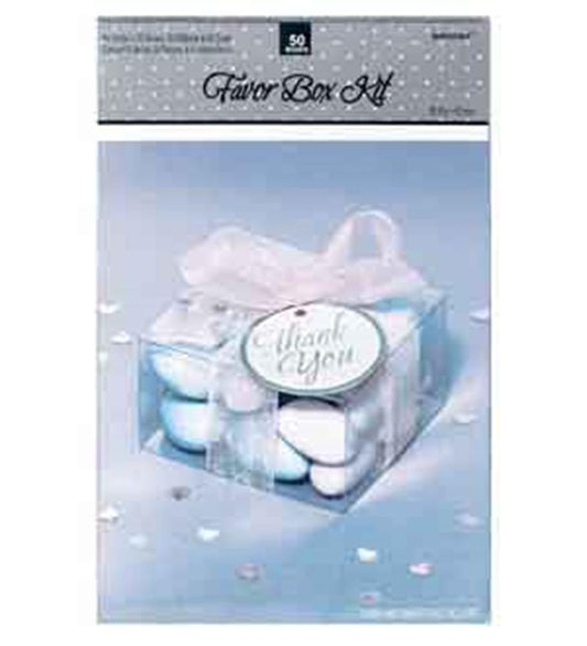 Clear square favor box filled with white and blue candies, tied with sheer white ribbon and Thank You tag.