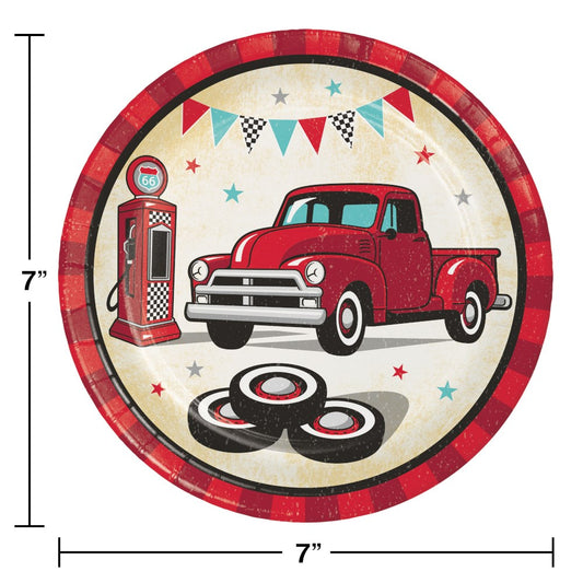 Round 7-inch paper plate with vintage red truck, old gas pump, tires, and festive bunting design.