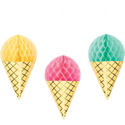 Three hanging honeycomb paper decorations shaped like ice cream cones with gold foil waffle cones and pastel yellow, pink,.