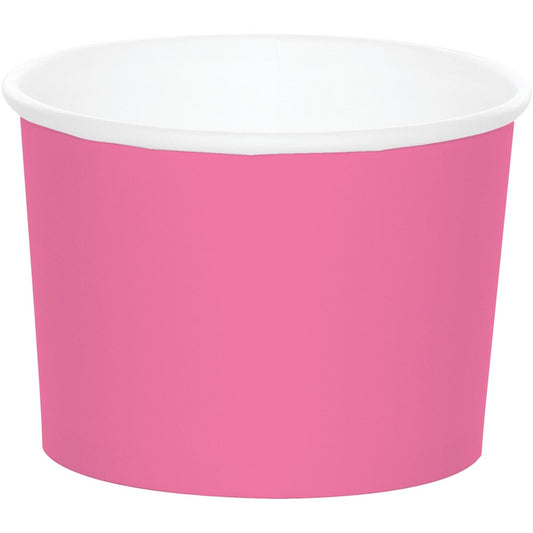 Set of eight candy pink paper treat cups with white interior, round shape.