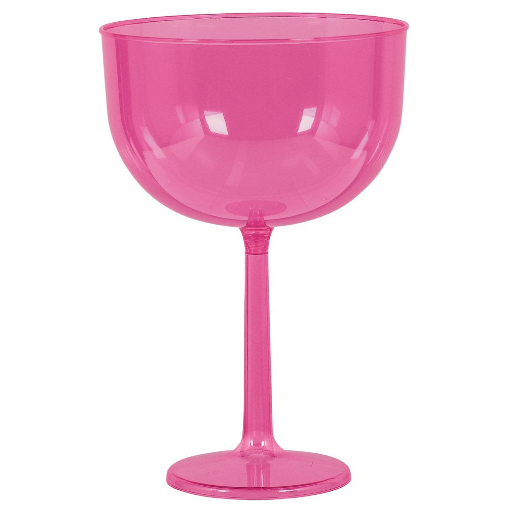 Bright pink oversized plastic wine glass with a tall stem and wide bowl.