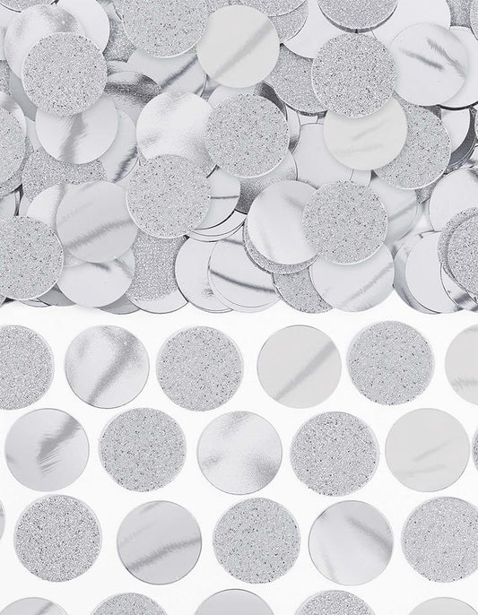 Silver metallic and glittery circular confetti pieces with a shiny foil finish.