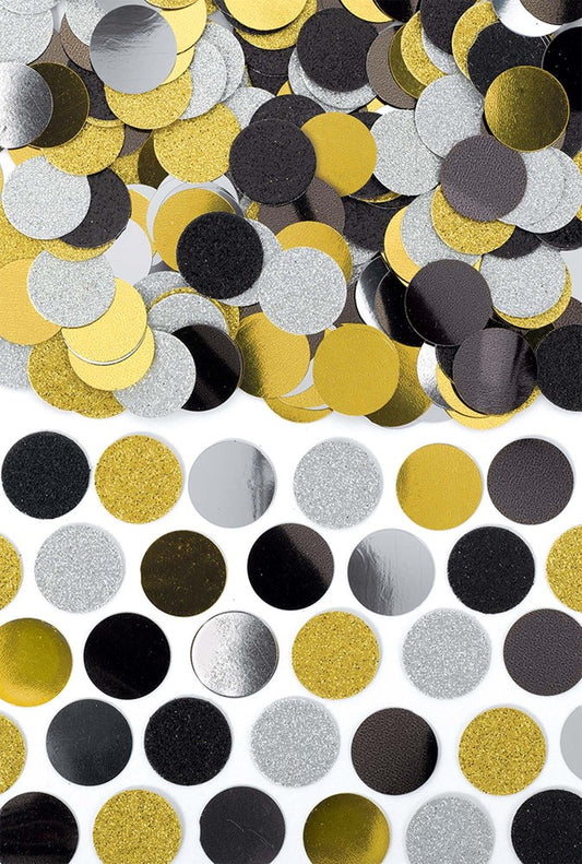 Assorted round confetti circles in black, silver, and gold with matte and metallic finishes, scattered and arranged.