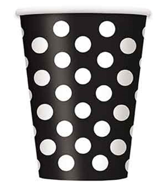 Black paper cup with white polka dots, tapered shape, smooth rim.