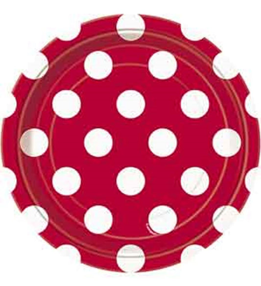 Red round plate with large white polka dots and a scalloped edge.