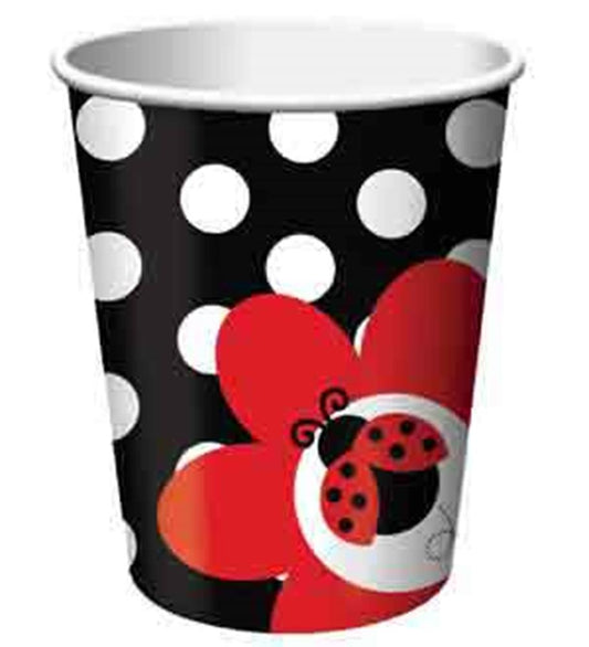Black paper cup with white polka dots and a red flower featuring a ladybug design, 9oz capacity.
