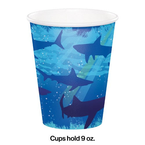 Blue disposable paper cup with underwater shark design, holds 9 oz.