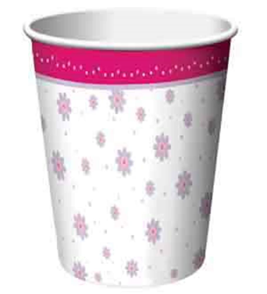 White cup with pink and purple floral patterns and a pink rim with white dots.