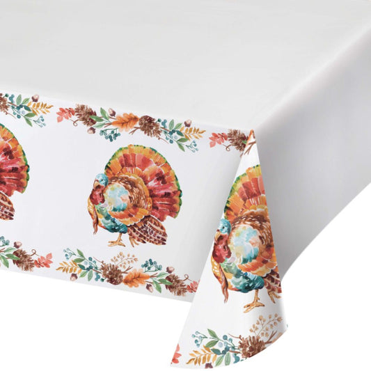 White paper tablecover with colorful turkey and autumn leaf border print for Thanksgiving decoration.