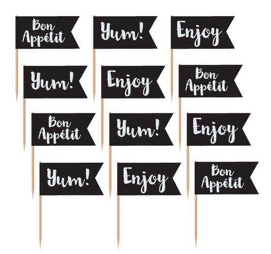 Black chalkboard-style flag picks with white script words like Yum!, Enjoy, and Bon Appétit on wooden sticks.