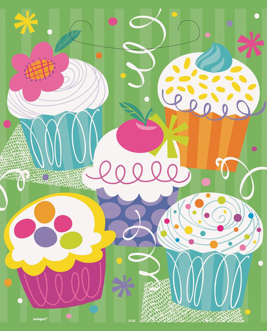 Colorful cupcake-themed loot bag with five illustrated cupcakes, swirls, flowers, and confetti on a green background.