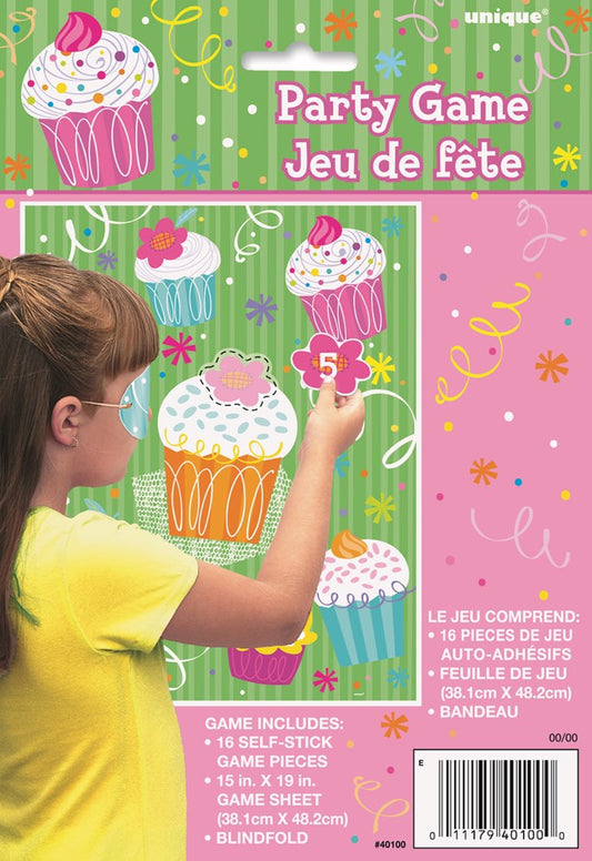 Colorful cupcake-decorating party game box with bright pink, green, and orange design and fun illustrations.