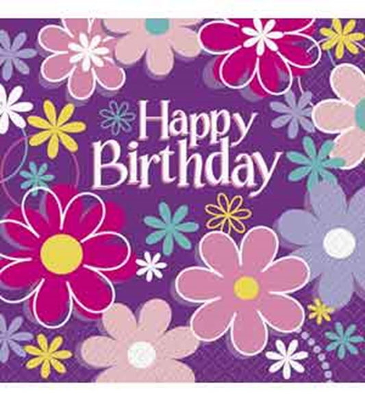 Purple square napkin with colorful pink, yellow, and blue flowers and white "Happy Birthday" text in the center.