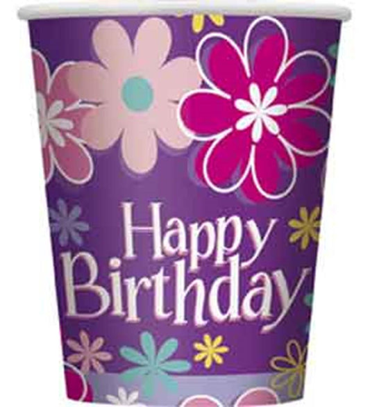 Purple disposable cup with colorful large floral designs and "Happy Birthday" text in white for kids' parties.