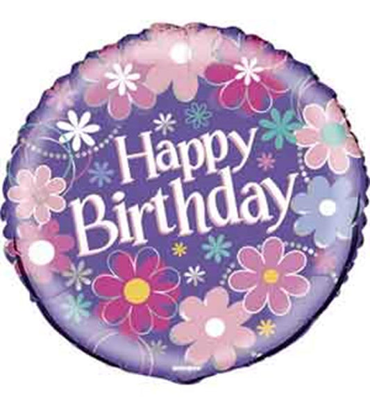 18-inch round purple foil balloon with colorful flower designs and "Happy Birthday" text in white.