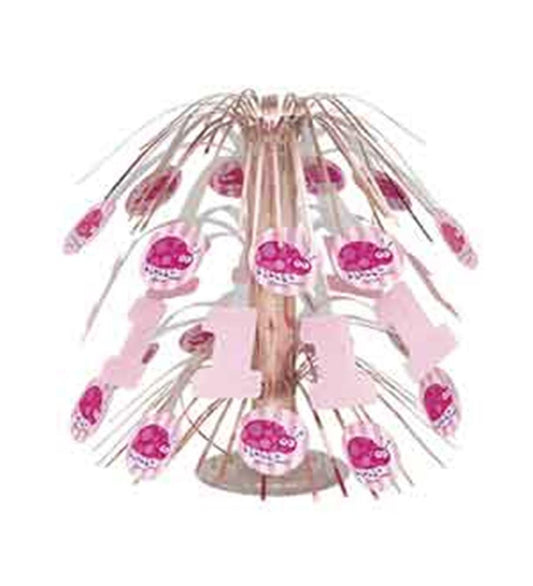 Pink and red ladybug-themed centerpiece with cascading wires and a large pink number one on a round base.