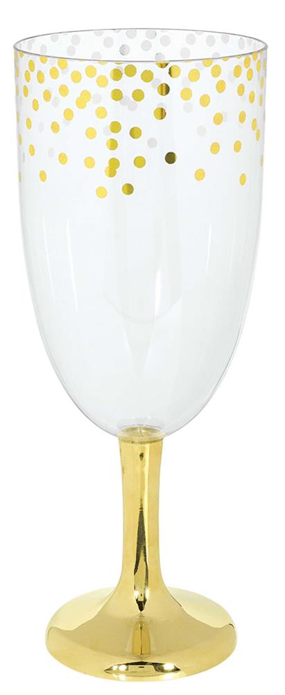Clear glass with gold polka dots around the rim atop a shiny gold pedestal base.
