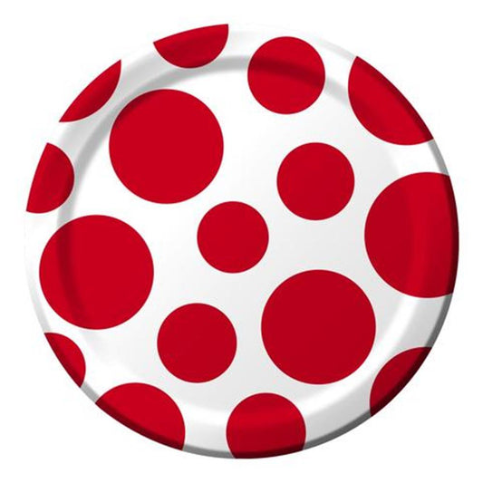 White round plate with varying sizes of bold red polka dots scattered across the surface.