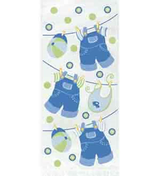 Blue denim-style baby overalls and green-striped hats hanging on a clothesline, with green and blue polka dot background on.