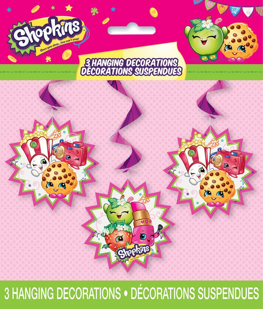Three colorful hanging swirl decorations featuring Shopkins characters with bright pink and yellow starburst backgrounds.