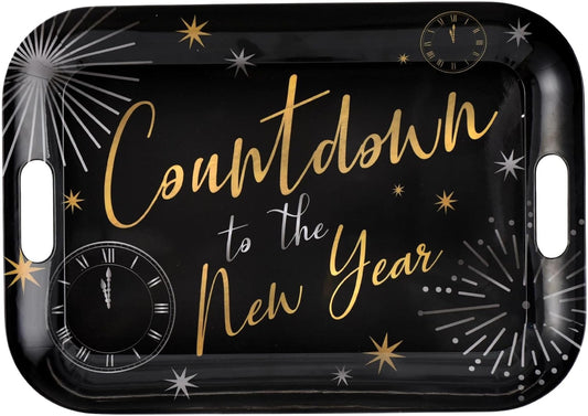 Black rectangular serving tray with gold and silver New Year countdown theme, featuring clocks and fireworks designs, and.