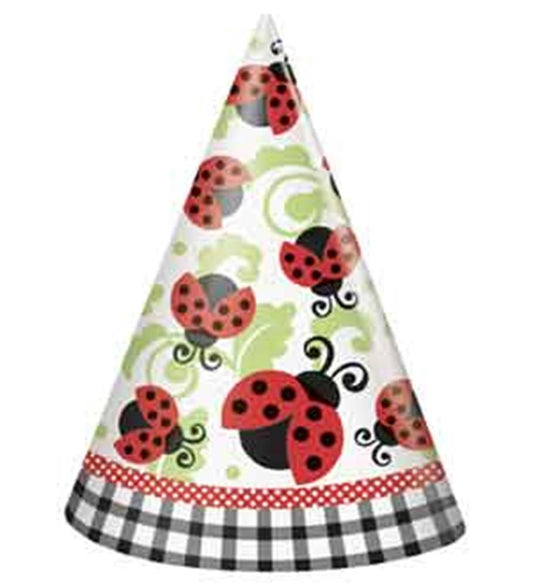 Cone-shaped paper party hat with red and black ladybug designs, green swirls, and a black-and-white checkered brim.