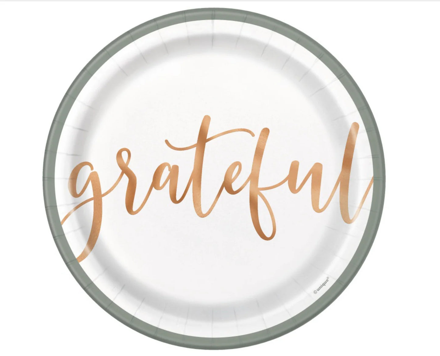 Round white paper plate with soft gray rim and the word "grateful" in large cursive copper lettering centered.