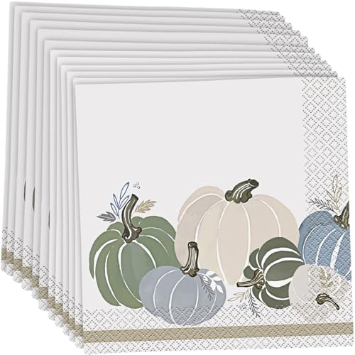 Set of folded pastel-colored napkins featuring soft green, blue, and beige pumpkins with delicate foliage and geometric.