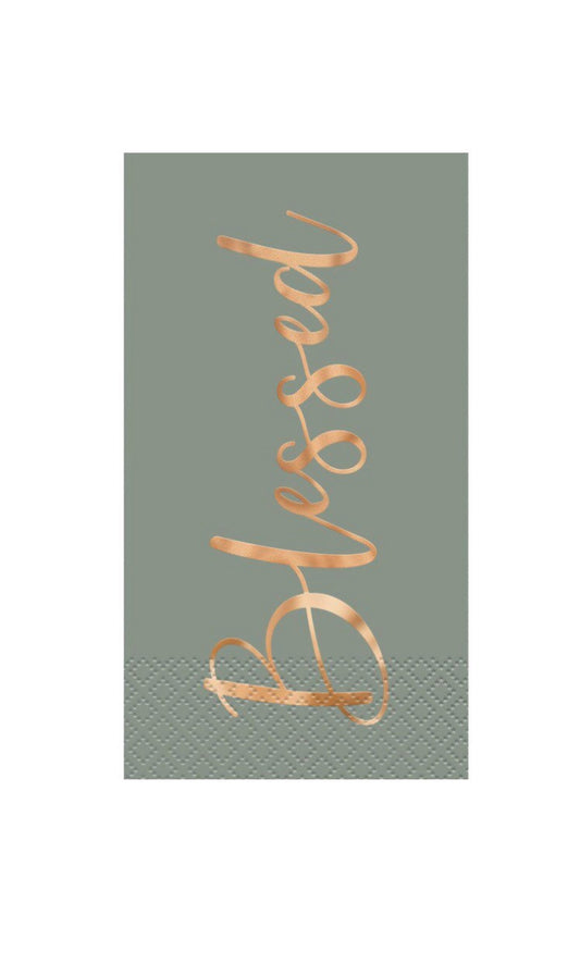 Rectangular muted sage-green paper napkin with cursive gold foil "Blessed" lettering and subtle dotted border pattern.