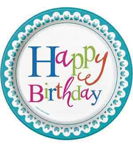Round paper plate with teal scalloped border, white center featuring multicolored "Happy Birthday" text in playful fonts.