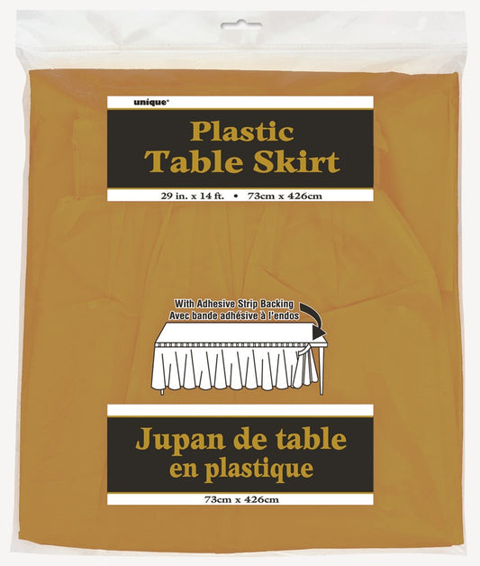 Gold plastic table skirt folded in packaging with black and white label detailing size and product info.