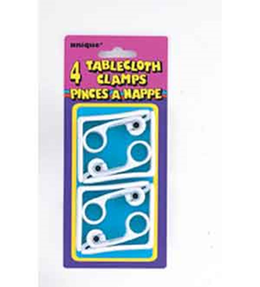 Set of four white plastic tablecloth clamps with round handles on purple and yellow packaging.