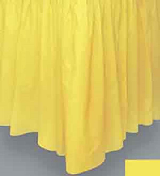 Soft yellow fabric tableskirt with gathered pleats and a flowing drape.