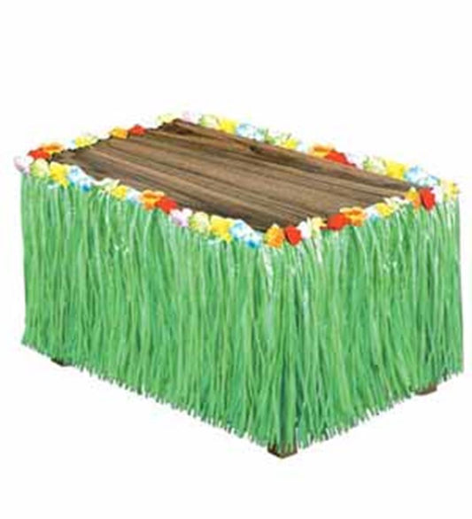 Green grass-style tableskirt with colorful flower accents along the top edge, 30x9 inches.