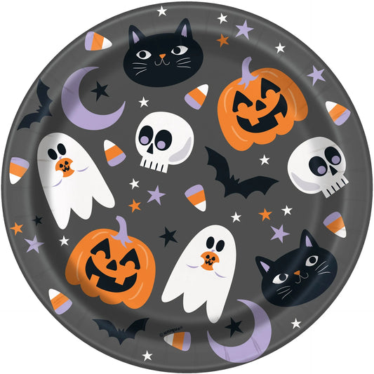 Round 7-inch paper plate with black background featuring smiling pumpkins, black cats, ghosts, skulls, bats, crescent moons,