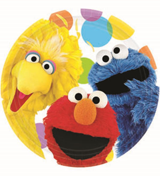 Round colorful paper plate featuring large faces of Big Bird in yellow, Elmo in red, and Cookie Monster in blue.