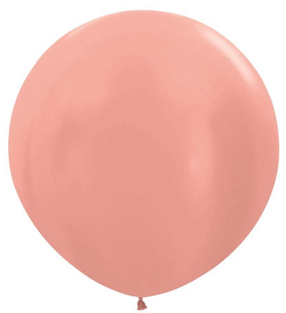 Two large round metallic rose gold latex balloons inflated and tied at the bottom.