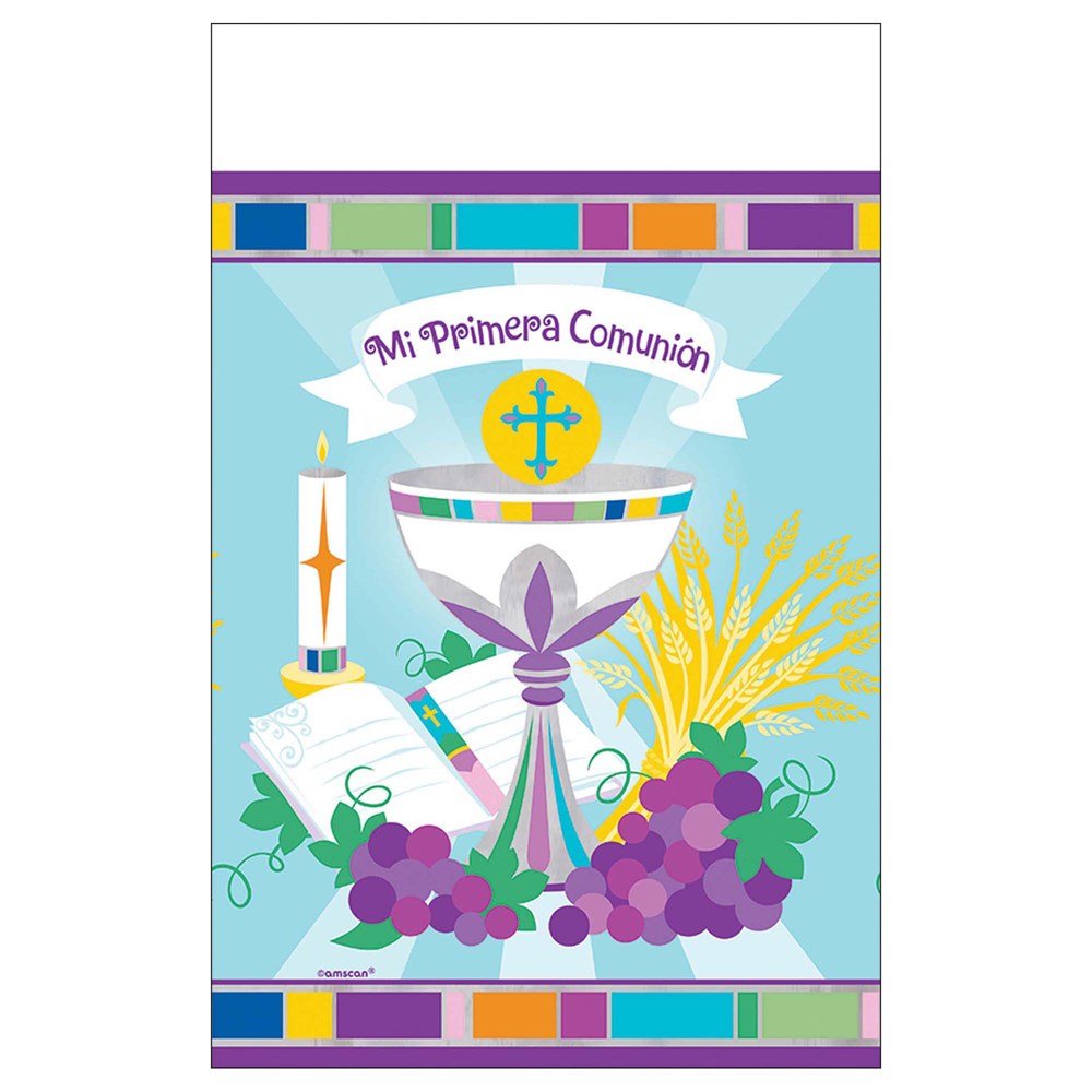 White tablecover with colorful border featuring chalice, host, candle, grapes, and wheat illustrations for a first communion