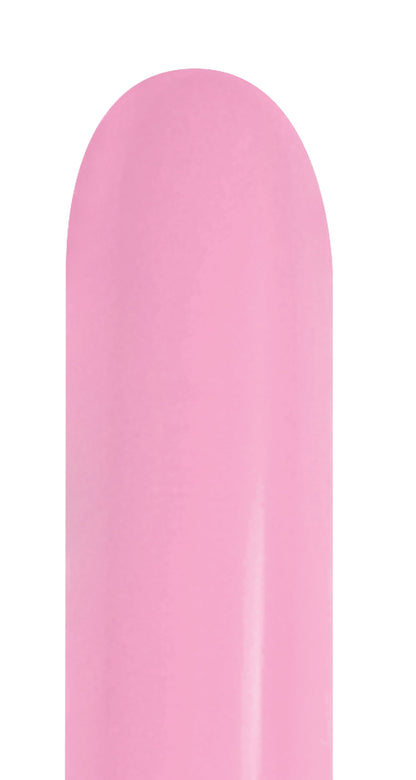 Long, cylindrical bubble gum pink latex balloon with a smooth surface and rounded tip.