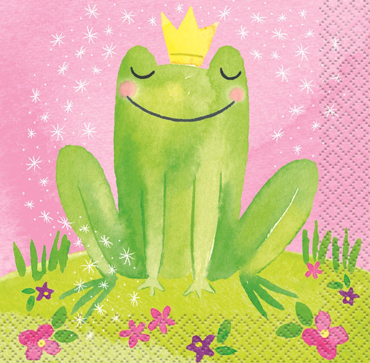 Square pink napkin with a smiling green frog wearing a yellow crown, surrounded by flowers and sparkles.