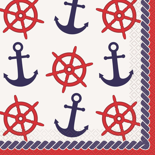 White paper napkin with red ship wheels, navy blue anchors, and a braided rope border in red, navy, and white.
