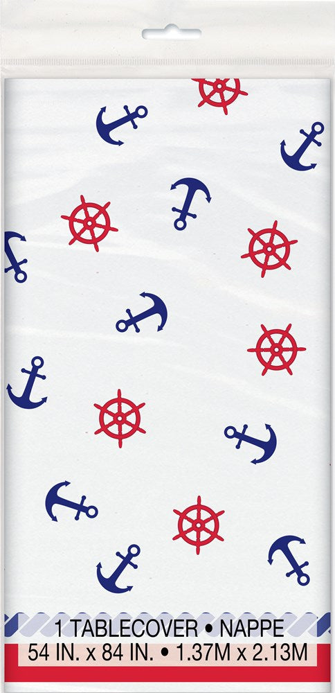 White rectangular tablecover with blue anchors and red ship wheels nautical pattern.