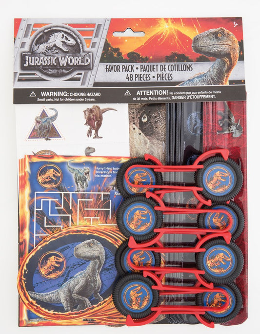 Jurassic World T-Rex party favor pack with red plastic noisemakers and dinosaur-themed plates and napkins.