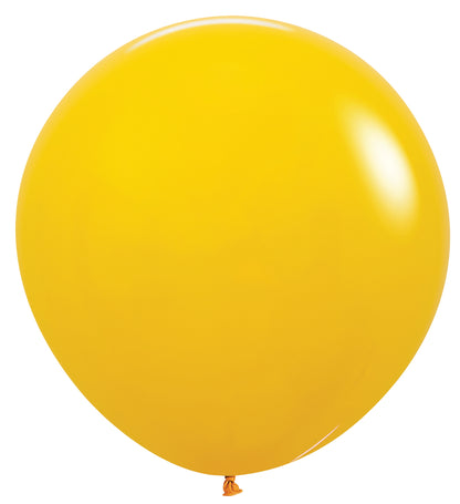 Large round honey yellow latex balloon with smooth surface and tied neck.