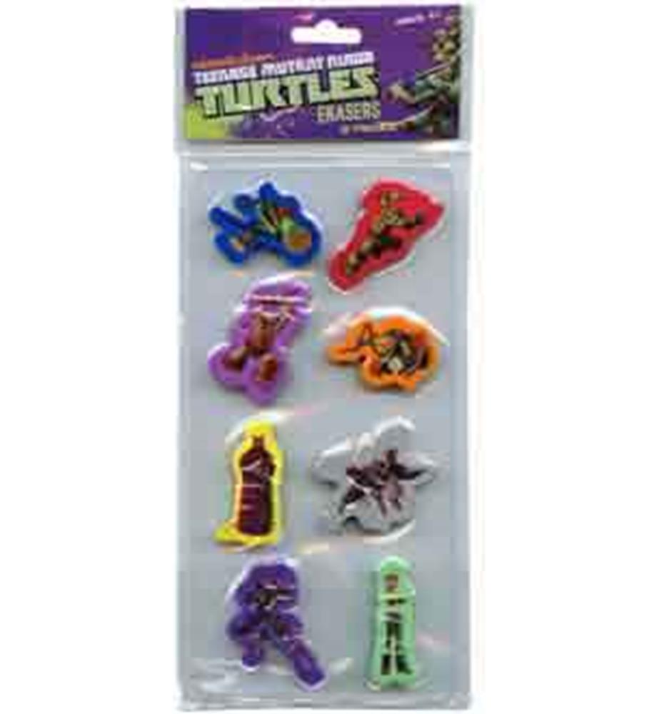 Set of 8 colorful Teenage Mutant Ninja Turtles erasers shaped like characters and weapons in plastic packaging.