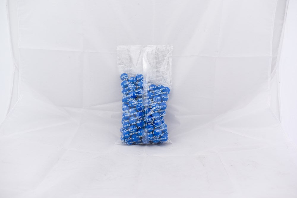 Clear plastic bag filled with bright blue round gumballs stacked inside.