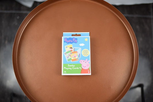 Peppa Pig jumbo card game box with colorful cartoon characters on blue and green background.