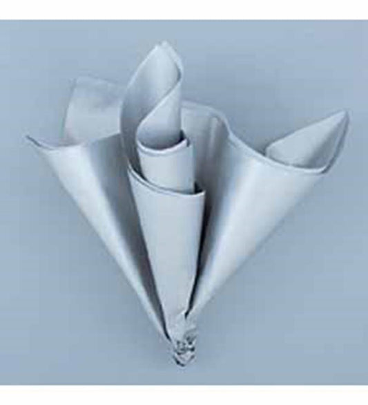 Five silver metallic tissue paper sheets folded into a decorative fan shape against a light background.